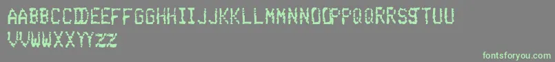 フォントBelchingUpSalisburySteak – 灰色の背景に緑のフォント