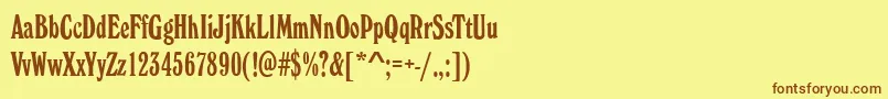 フォントWhitehallElongatedRegular – 茶色の文字が黄色の背景にあります。
