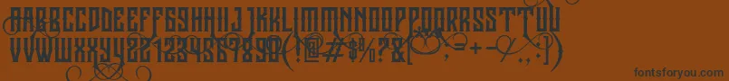JibrielSmallCaps Font – Black Fonts on Brown Background