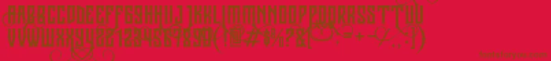 JibrielSmallCaps-fontti – ruskeat fontit punaisella taustalla