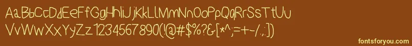 Polanstronk-fontti – keltaiset fontit ruskealla taustalla