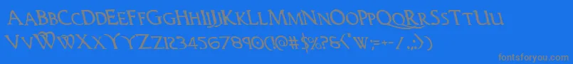 Woodgodleft-Schriftart – Graue Schriften auf blauem Hintergrund
