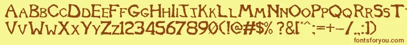 Tomb2013 Font – Brown Fonts on Yellow Background