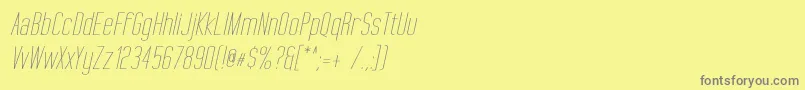 フォントTallFilmsExpandedOblique – 黄色の背景に灰色の文字