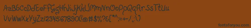 フォントEverlicious – 黒い文字が茶色の背景にあります