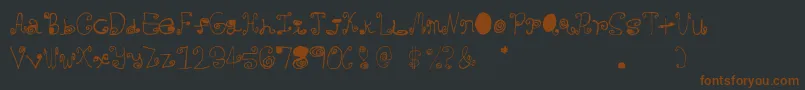 Crazycurlz Font – Brown Fonts on Black Background