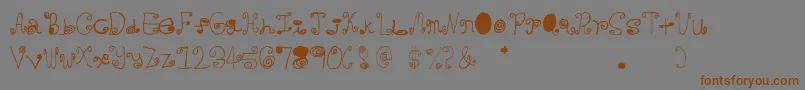 Weitere Informationen zur Crazycurlz-Schriftart Crazycurlz-Schriftart – Braune Schriften auf grauem Hintergrund