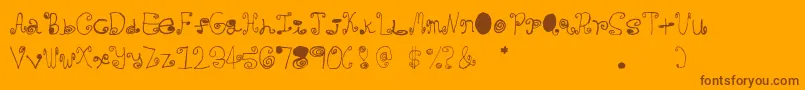 Crazycurlz Font – Brown Fonts on Orange Background