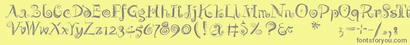 Zeitgeisterbahn-Schriftart – Graue Schriften auf gelbem Hintergrund