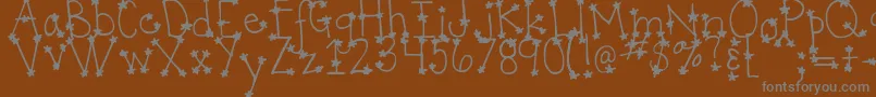 DjbItsFullOfStars Font – Gray Fonts on Brown Background