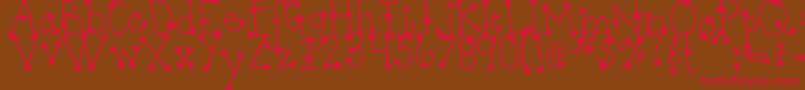 フォントDjbItsFullOfStars – 赤い文字が茶色の背景にあります。