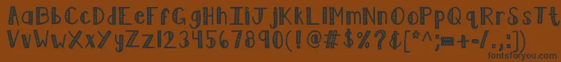 Kblimelight-fontti – mustat fontit ruskealla taustalla
