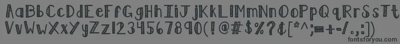 フォントKblimelight – 黒い文字の灰色の背景