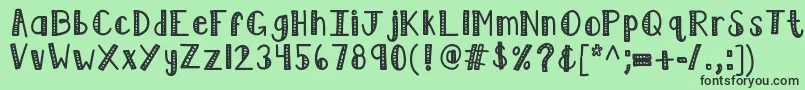 フォントKblimelight – 緑の背景に黒い文字