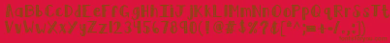 Kblimelight-Schriftart – Braune Schriften auf rotem Hintergrund