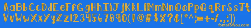 フォントKblimelight – オレンジ色の文字が青い背景にあります。