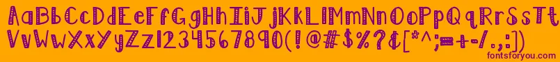 Czcionka Kblimelight – fioletowe czcionki na pomarańczowym tle