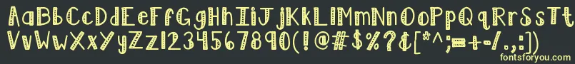 フォントKblimelight – 黒い背景に黄色の文字