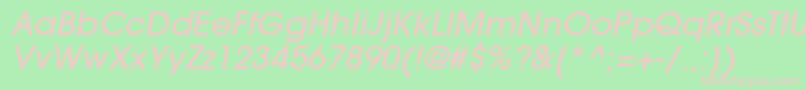 ItcAvantGardeGothicLtMediumOblique-fontti – vaaleanpunaiset fontit vihreällä taustalla