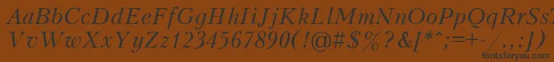 フォントKudriashovItalic – 黒い文字が茶色の背景にあります