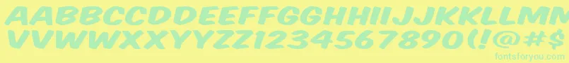 KomikaTitleWide Font – Green Fonts on Yellow Background