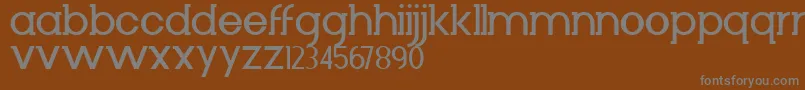 Czcionka Diminuto – szare czcionki na brązowym tle