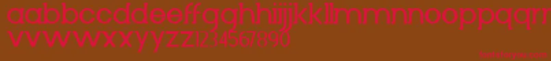 フォントDiminuto – 赤い文字が茶色の背景にあります。