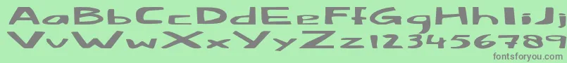 Fatlittlepiggy-fontti – harmaat kirjasimet vihreällä taustalla