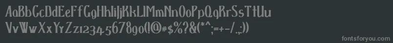 フォントDspenserbold – 黒い背景に灰色の文字