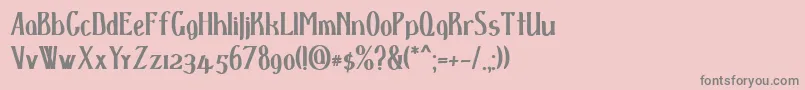 フォントDspenserbold – ピンクの背景に灰色の文字