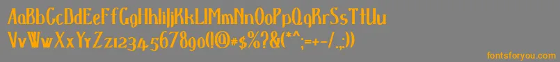 フォントDspenserbold – オレンジの文字は灰色の背景にあります。