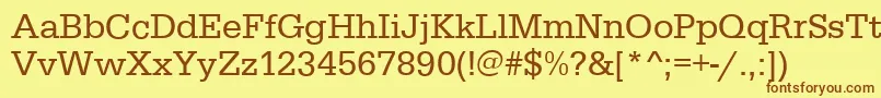 フォントEgyptiennestdRegular – 茶色の文字が黄色の背景にあります。