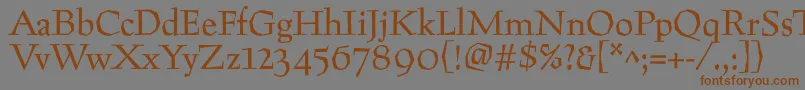 フォントPreissig – 茶色の文字が灰色の背景にあります。