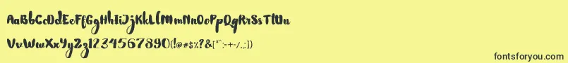Шрифт NightamoreBrushFreeFont – чёрные шрифты на жёлтом фоне