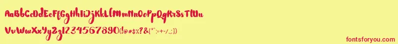 NightamoreBrushFreeFont-fontti – punaiset fontit keltaisella taustalla