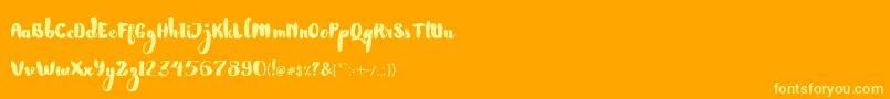 NightamoreBrushFreeFont Font – Yellow Fonts on Orange Background