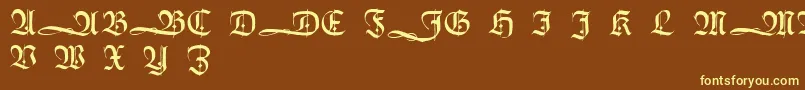 HumboldtfrakturInitialen-fontti – keltaiset fontit ruskealla taustalla