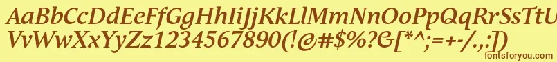 フォントAndulkaBookProBoldItalic – 茶色の文字が黄色の背景にあります。