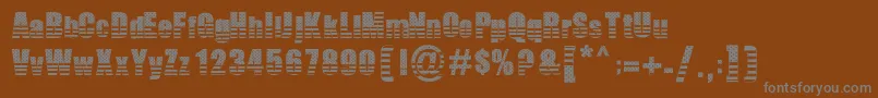 フォントTheAmerican – 茶色の背景に灰色の文字