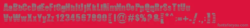 フォントTheAmerican – 赤い背景に灰色の文字