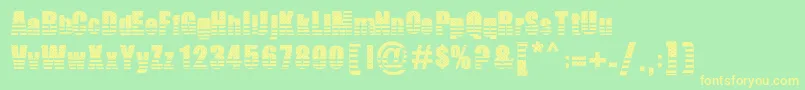 フォントTheAmerican – 黄色の文字が緑の背景にあります