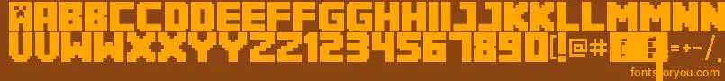 Minecrafter3Regular Font – Orange Fonts on Brown Background