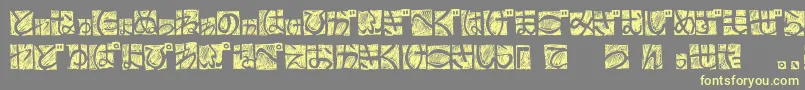 Czcionka BdHiraganaKuro – żółte czcionki na szarym tle
