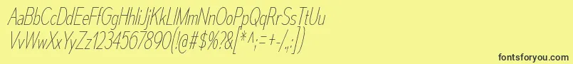 MesmerizeCdUlIt Font – Black Fonts on Yellow Background