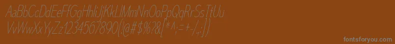 MesmerizeCdUlIt-fontti – harmaat kirjasimet ruskealla taustalla
