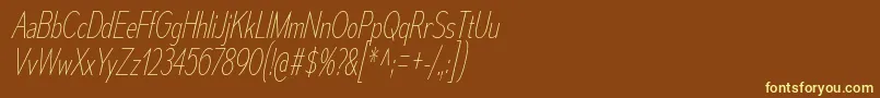 MesmerizeCdUlIt-fontti – keltaiset fontit ruskealla taustalla