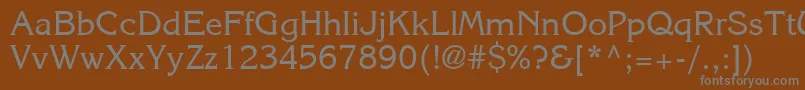 Czcionka ItcKorinnaLtRegular – szare czcionki na brązowym tle