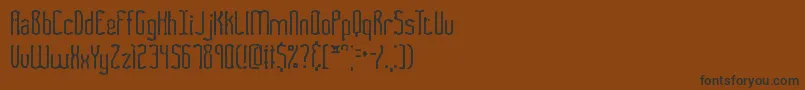 FasciiSmudgeBrk-Schriftart – Schwarze Schriften auf braunem Hintergrund