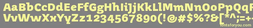 JuvenismediumBold-Schriftart – Gelbe Schriften auf grauem Hintergrund