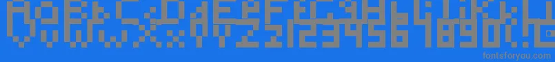 Toosimple-fontti – harmaat kirjasimet sinisellä taustalla